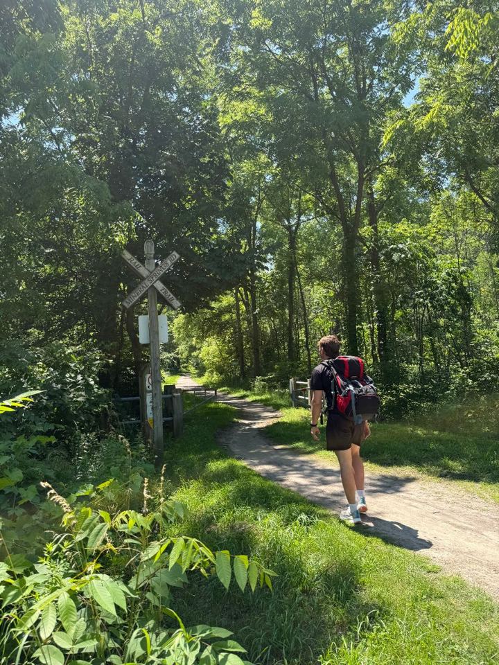 Jacob passing the Mineral Springs Road rail trail crossing