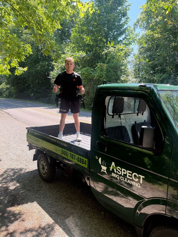 Jacob giving a thumbs up from the Aspect truck bed